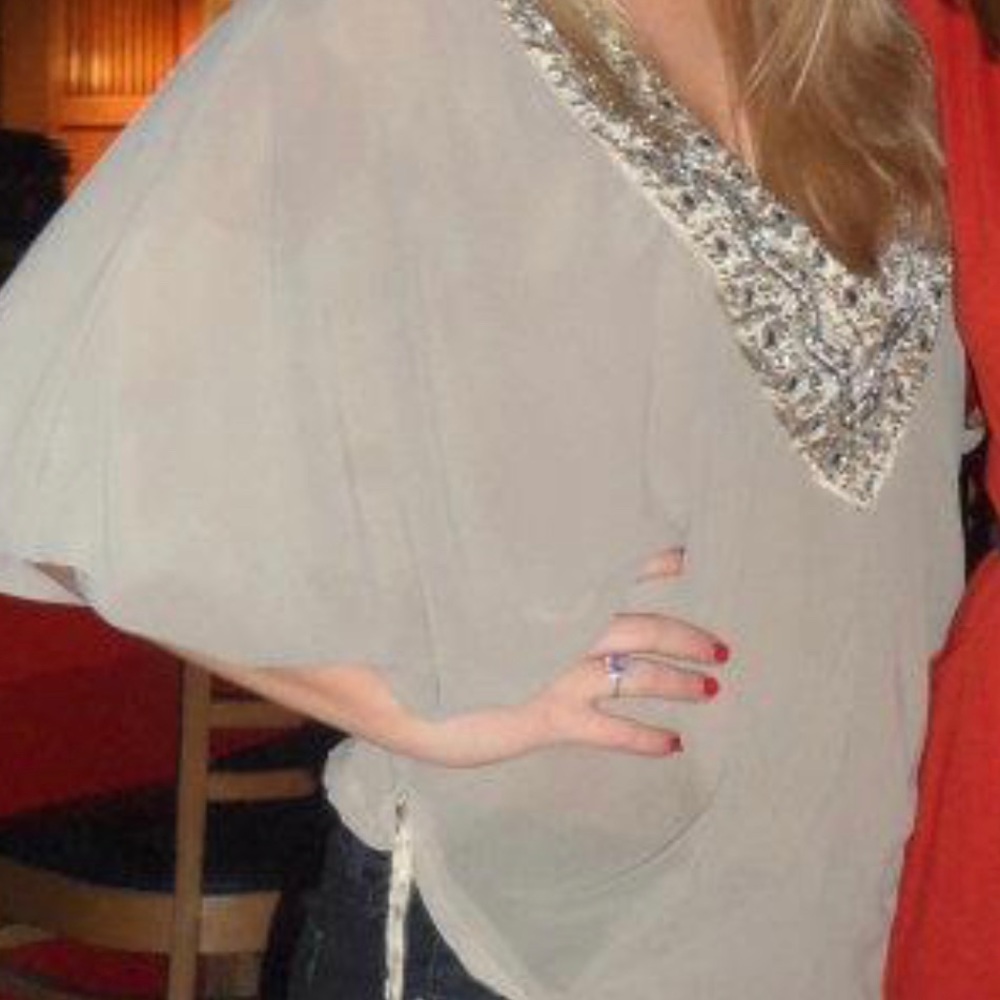 Tan flowy top with embellished neck